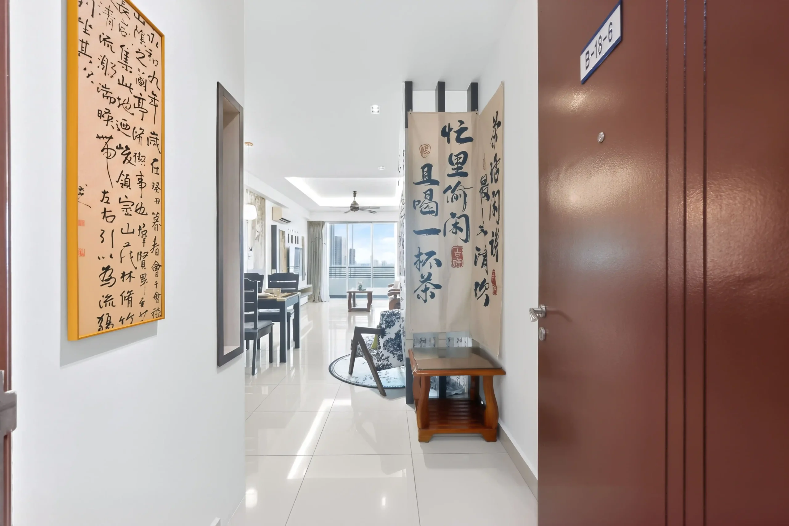 Outdoor swimming pool facility available for guests staying at high-rise Ipoh condo