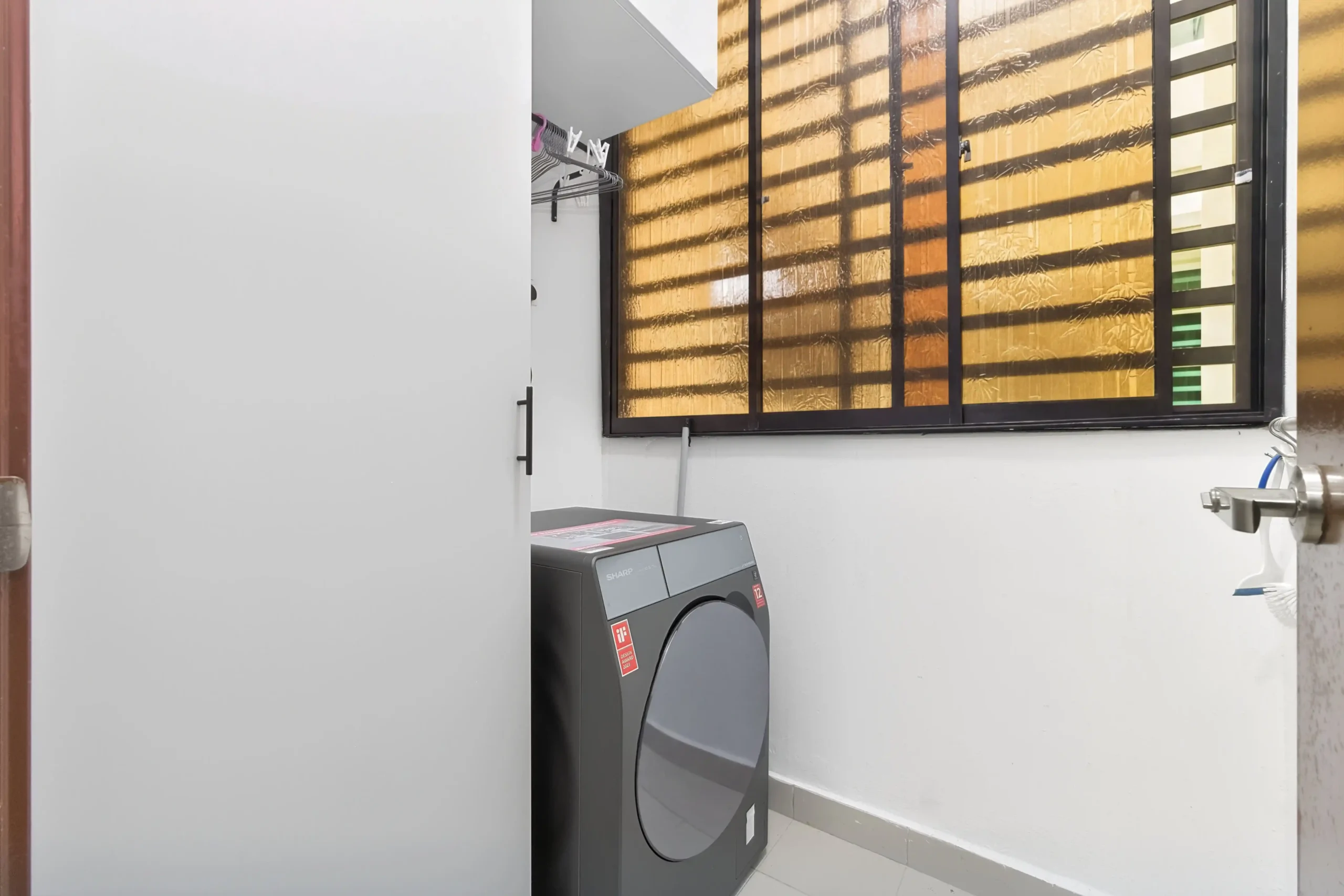 In-house washing machine facility available for long-stay guests in Ipoh apartment