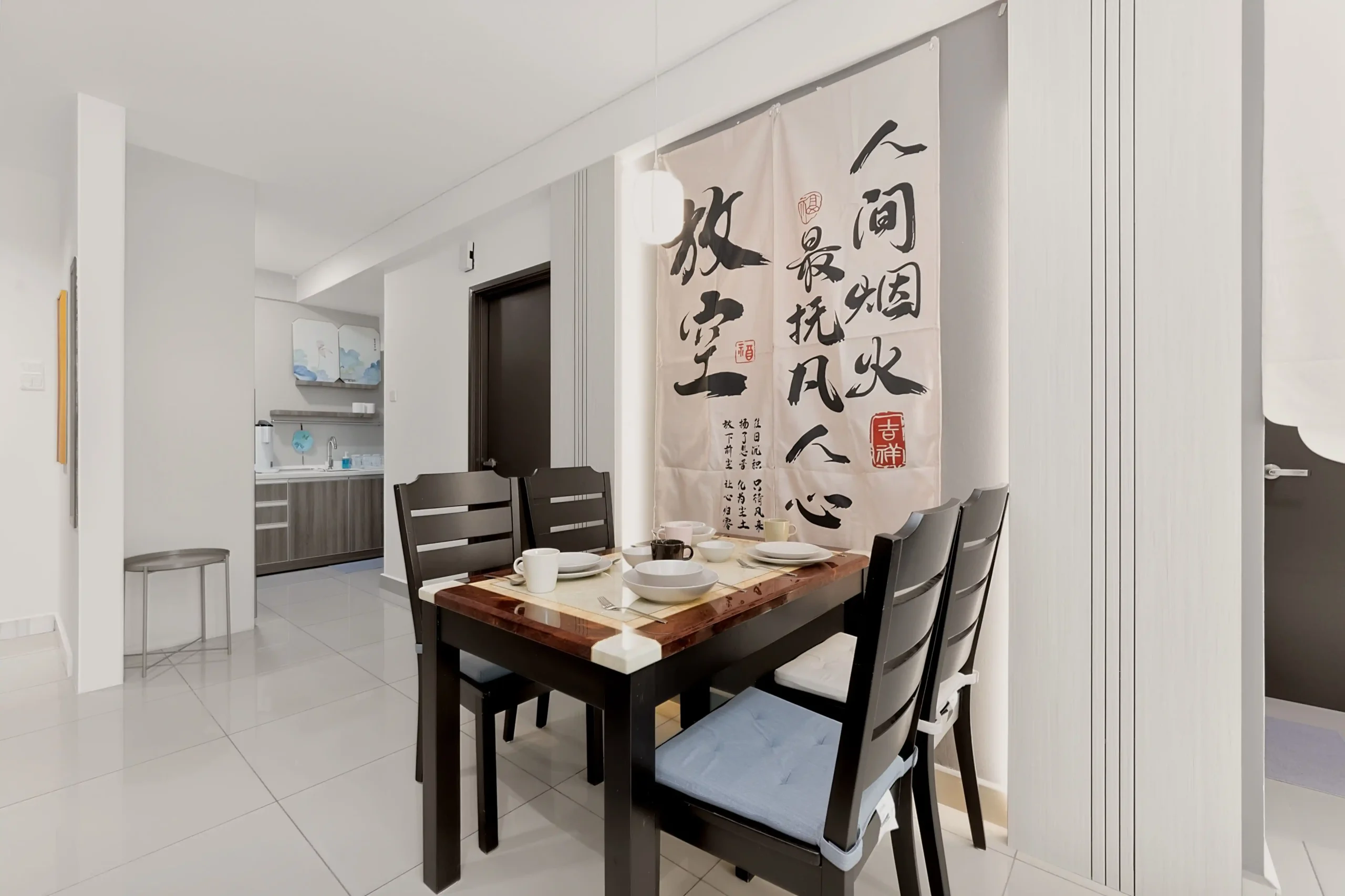 Well-maintained kitchen counter with electric kettle and cooking facilities in Ipoh