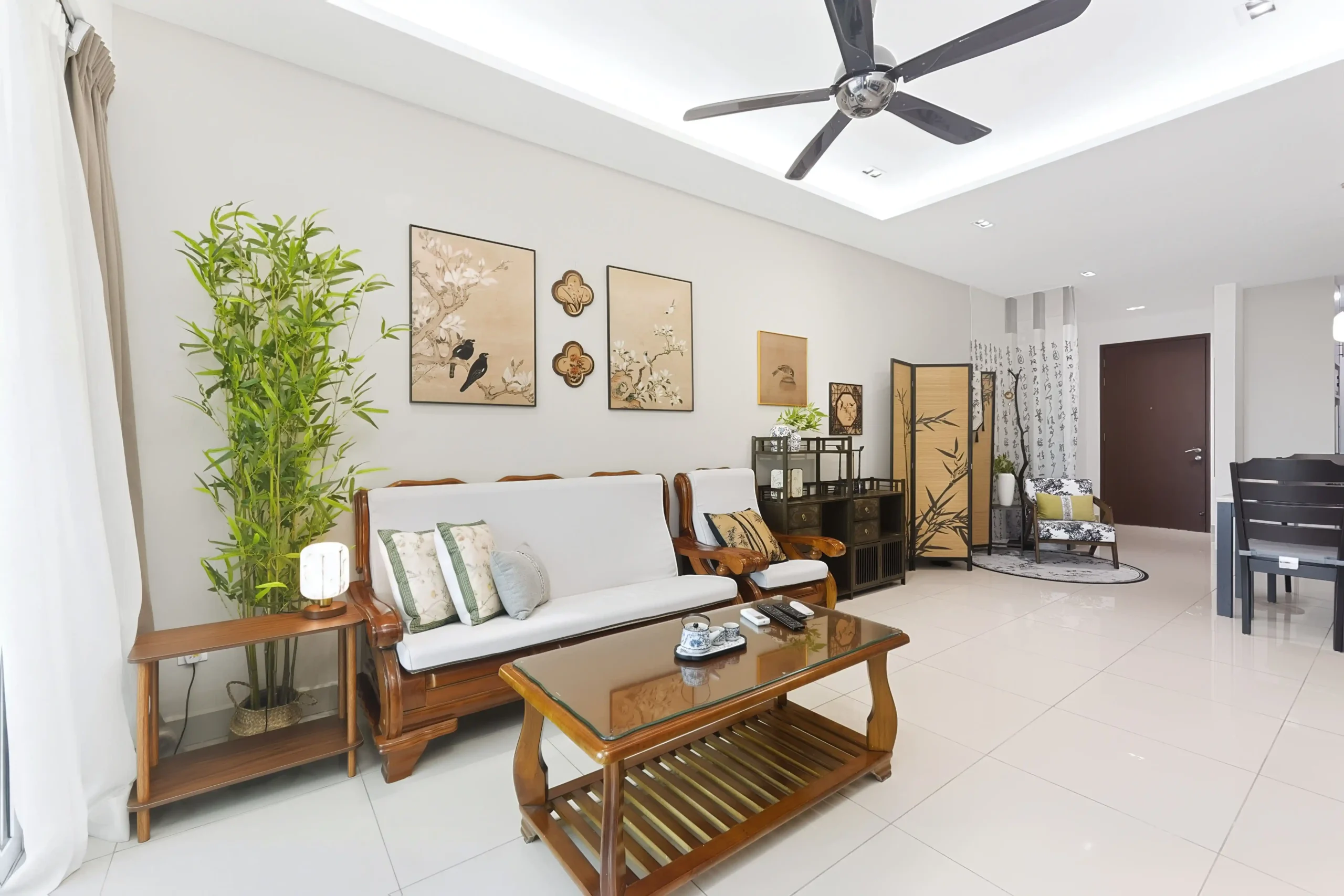 Bright and airy open-plan living and dining area with ceiling fan and air conditioning