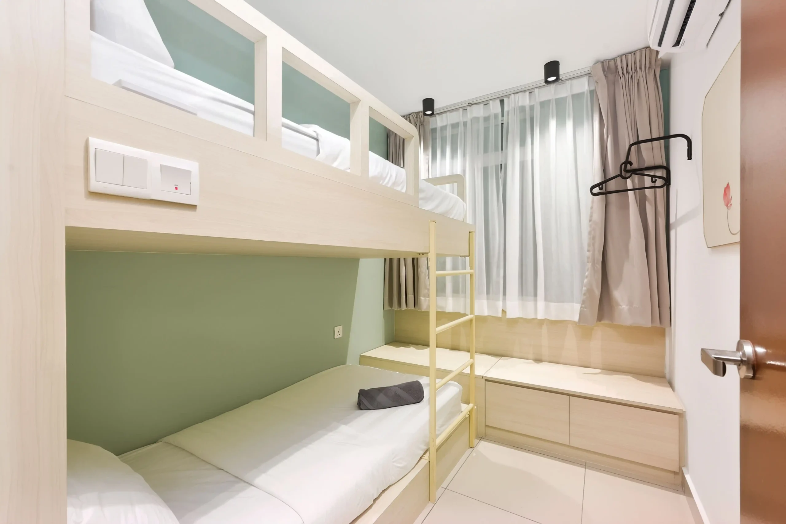 Clean bunk bed room layout in family-friendly 3-bedroom apartment Ipoh