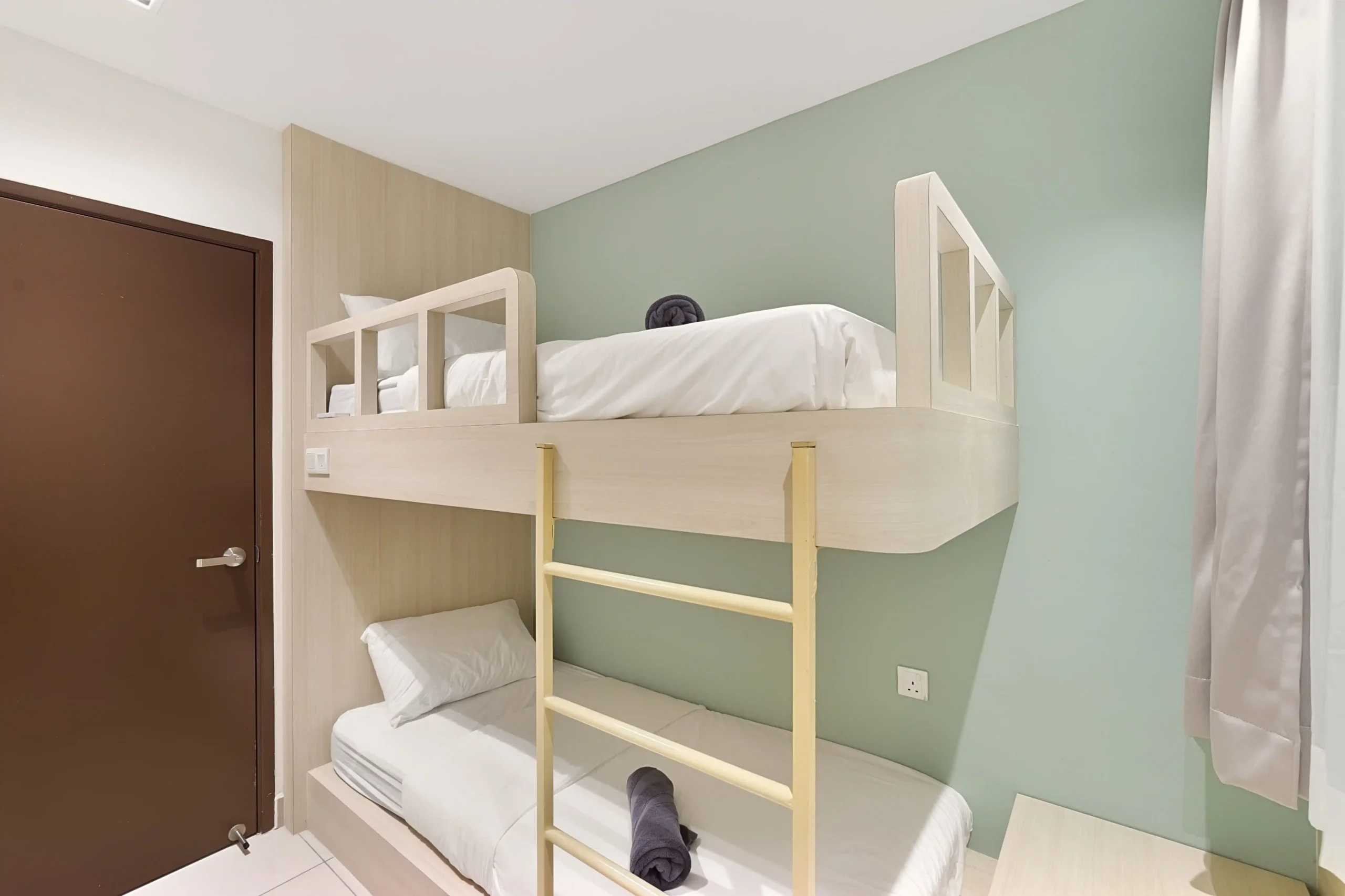 Third bedroom with single double decker bunk beds ideal for kids or friends