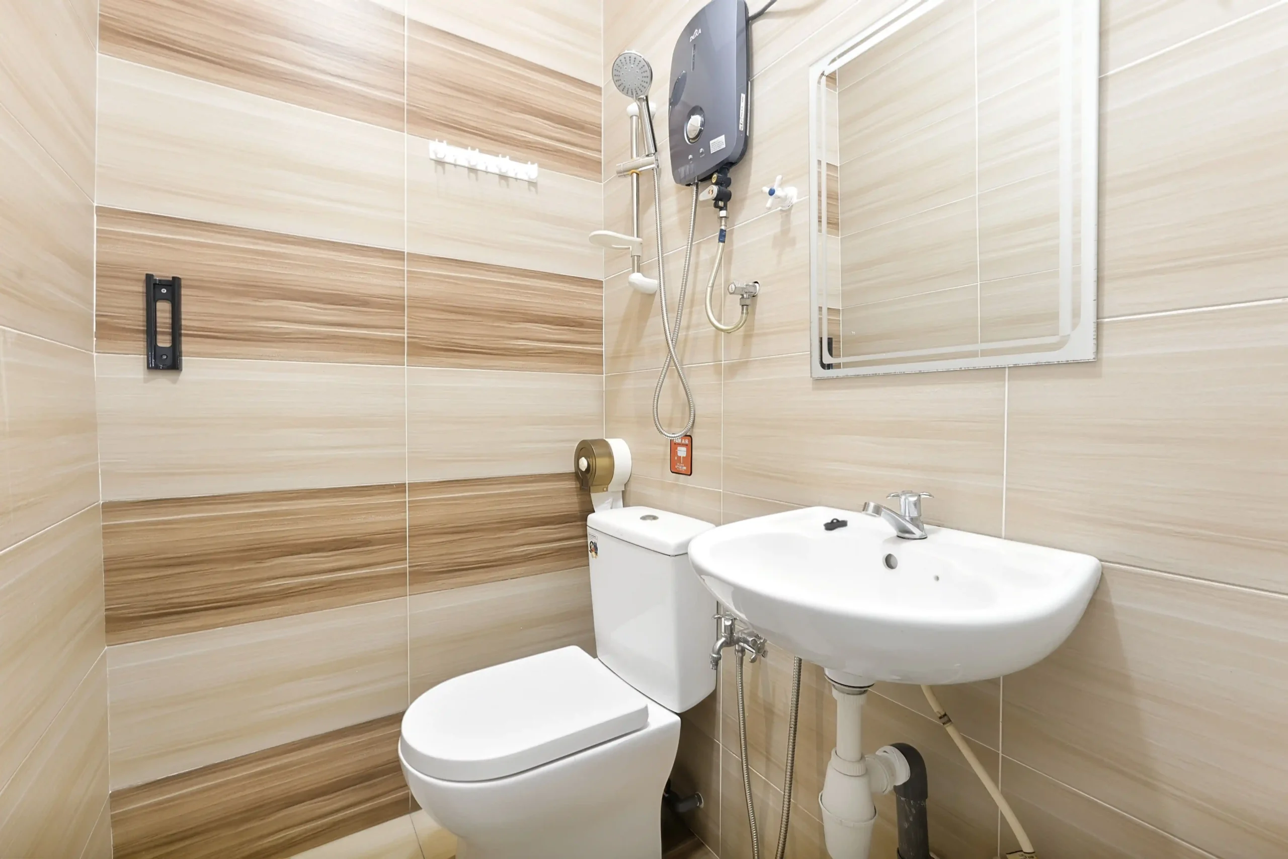 Provided bath amenities including towels, shampoo, and shower gel