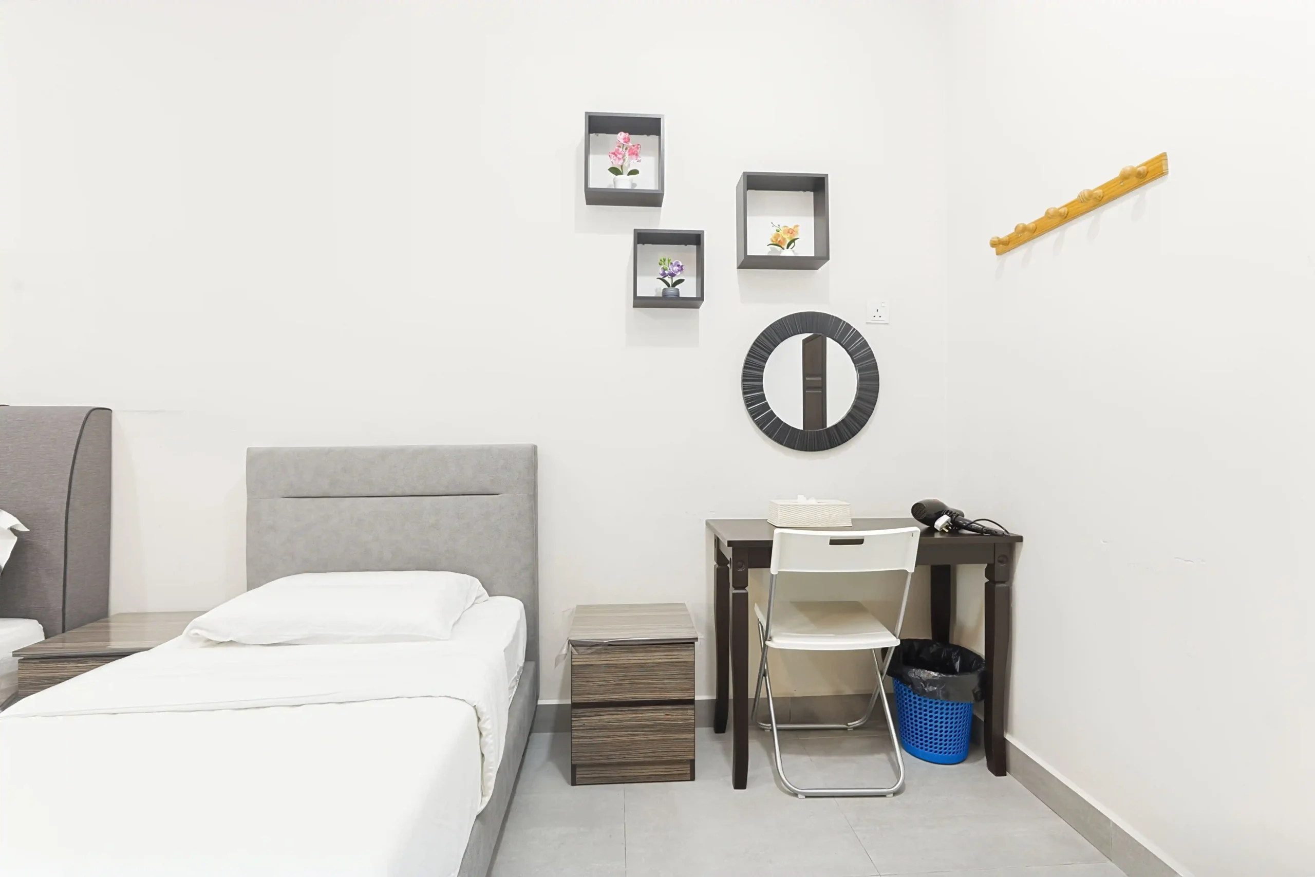 Cozy twin bedroom setup with air-conditioning for group stays Ipoh