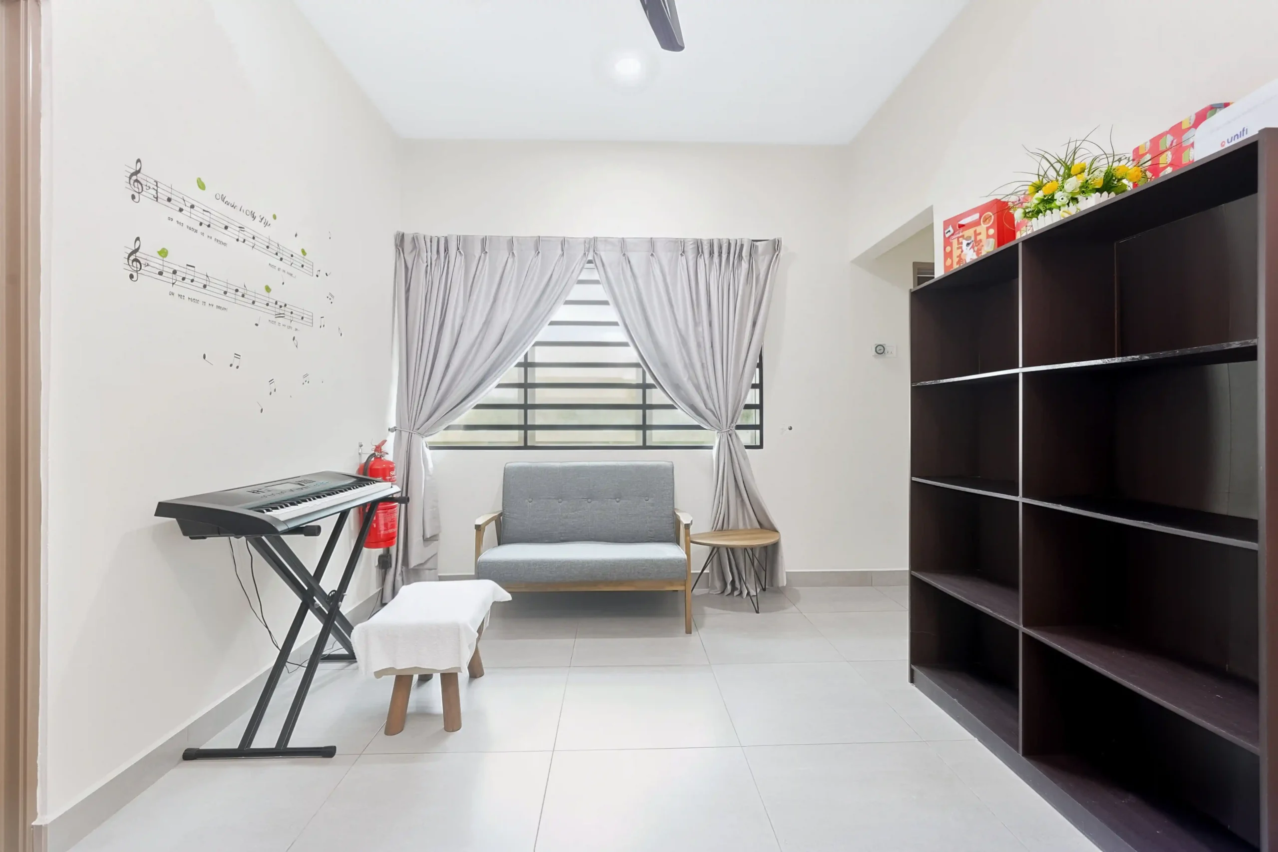 small living room with piano