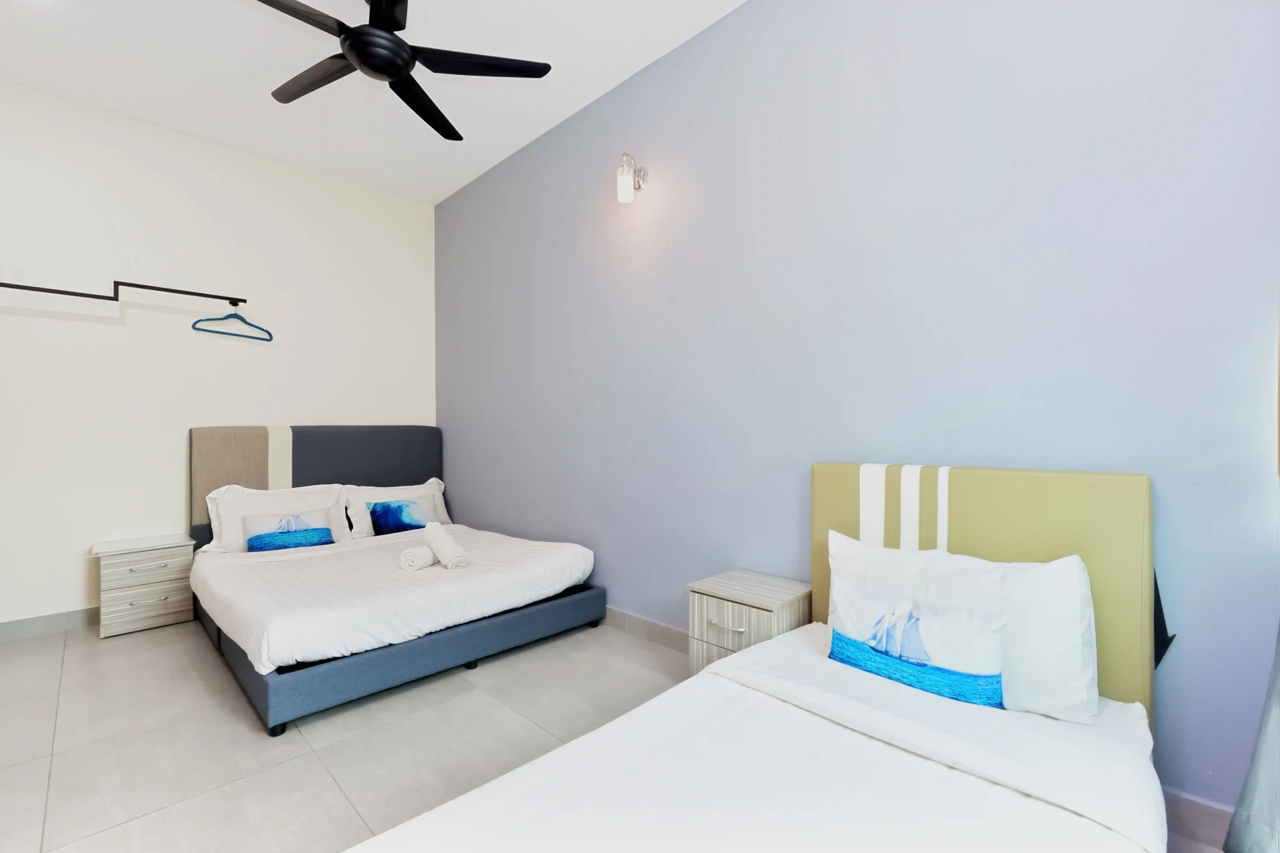 Air-conditioned Bedroom 1 for 3 guests at 7-bedroom homestay Ipoh
